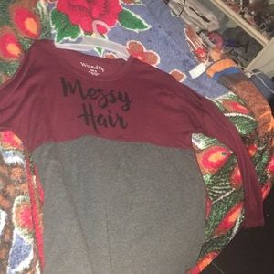 Long sleeve burgundy shirt with message on it